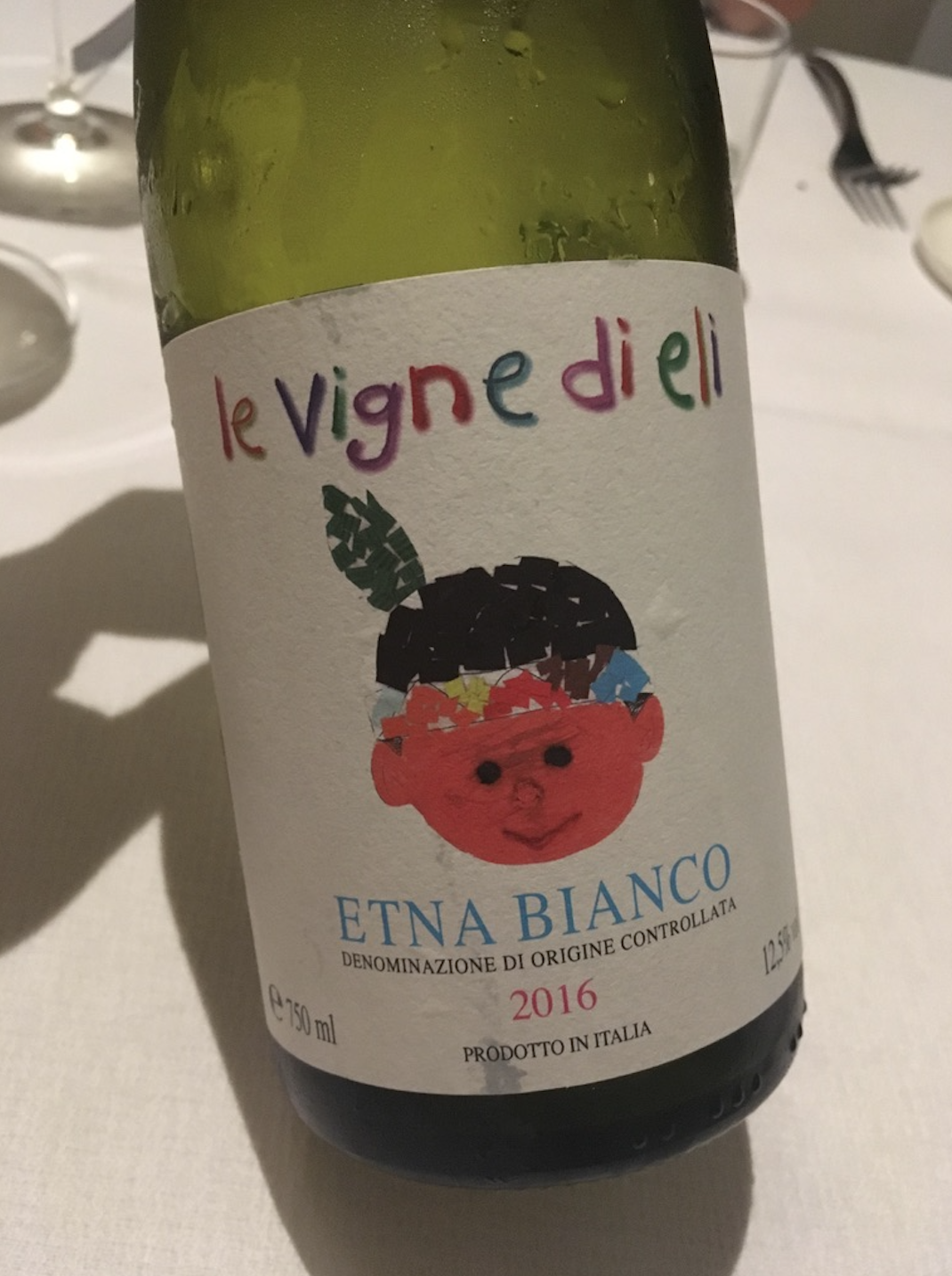 Le Vigne di Eli winery wine label close-up, Marco de Grazia’s Etna project supporting pediatric hospital in Florence